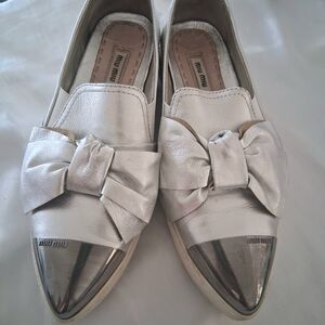 Miu Miu Silver Leather Bow Loafers with Metallic Cap Toes